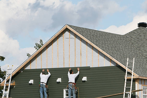 Professional Emergency Siding Repair technician working in North Lewisburg, OH